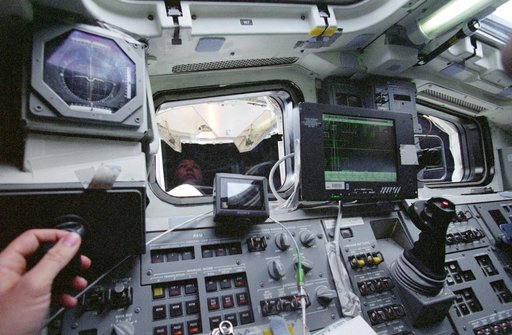 View from aft flight deck of undocking with ISS