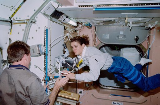 Julie Payette installs camera on mount in the Node 1/Unity module