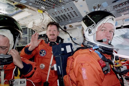Jett, Tanner and Garneau during re-entry preparations for STS-97