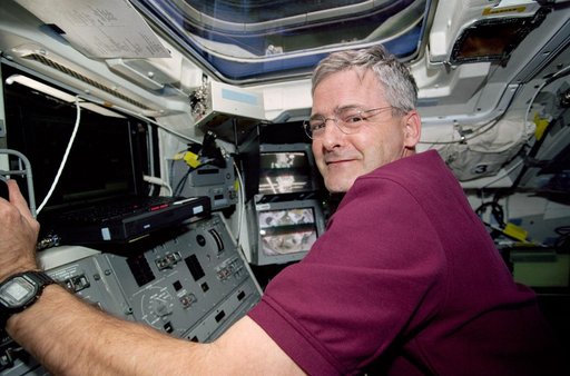 MS Garneau operates the RMS arm during the third EVA of STS-97