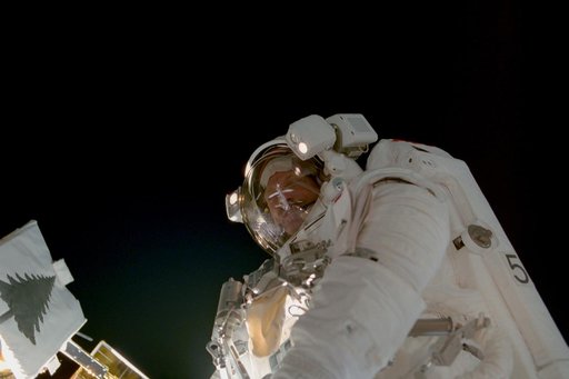 Tanner poses by the Floating Potential Probe during the third EVA of STS-97