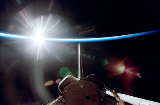 Orbital sunrise / sunset during mission STS-98