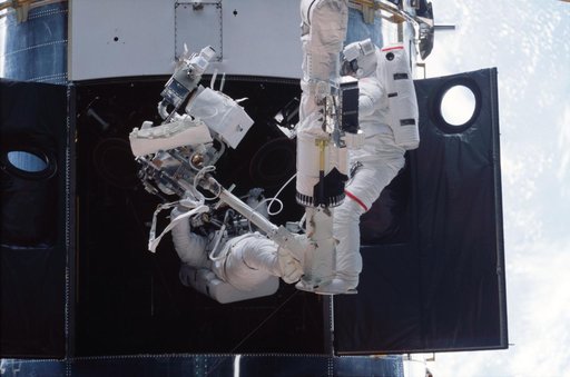 1st EVA - MS Smith and Grunsfeld during RSU changeout
