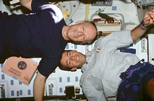 Various views of the STS-103 crew on the middeck
