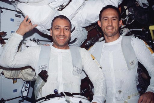 STS-109 MS Newman and Massimino in airlock after EVA