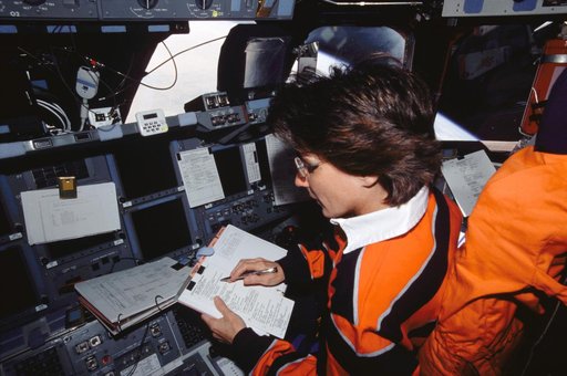 STS-109 MS Currie on forward flight deck