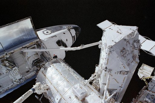 Endeavour, PMA2, RMS, and S0 (S-zero) truss photographed during STS-111 UF-2 EVA 1