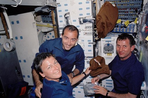 Whitson, Perrin, and Treschev by the galley on Endeavour's MDK during STS-111 UF-2