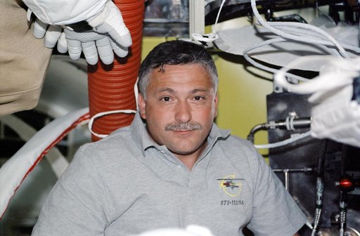 STS112 MS Yurchikhin in Quest airlock preparing for EVA 2