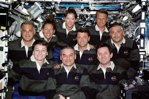 Expedition 5 and STS-112 crews pose for portrait in Destiny module