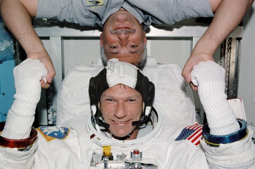 Portrait view of STS-112 MS Sellers and MS Yurchikhin in Quest airlock
