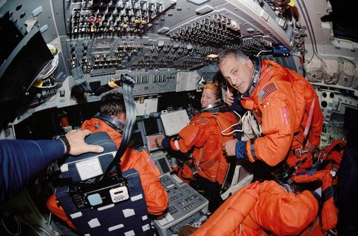 Fish-eye view of PLT Melroy and MS Wolf on forward flight deck