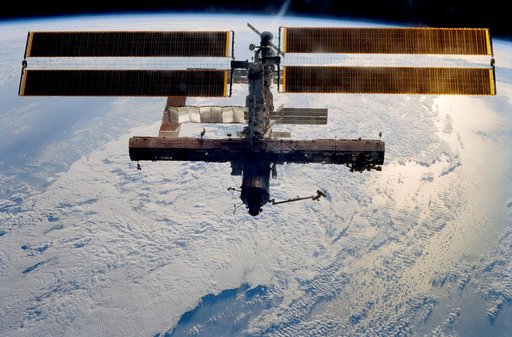 Exterior views of ISS during Undocking Operations for STS-113