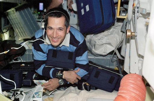Herrington floats on Endeavour's MDK during STS-113