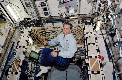 Wetherbee poses in the U.S. Lab during STS-113