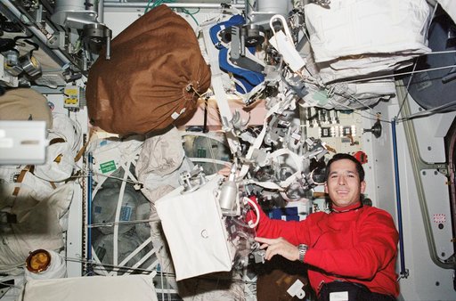 Herrington works with EVA tools / toolbox in the U.S. Lab during STS-113