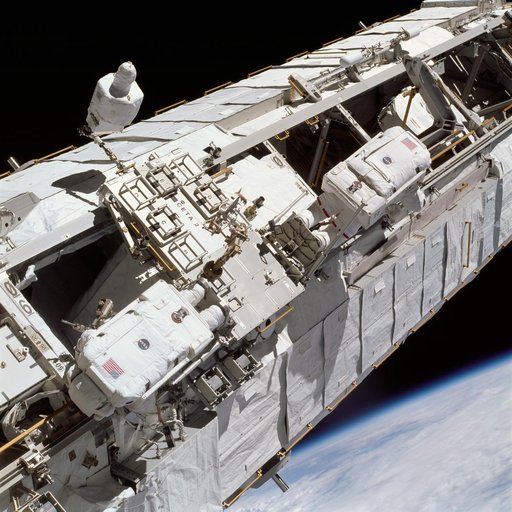 Lopez-Alegria and Herrington test foot restraints on CETA cart 2 during STS-113 EVA OPS
