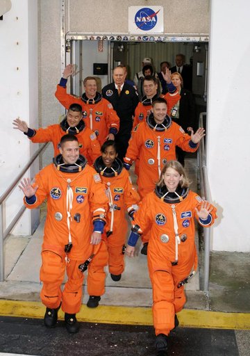 STS-120 crew leaves the Operations and Checkout bldg at KSC
