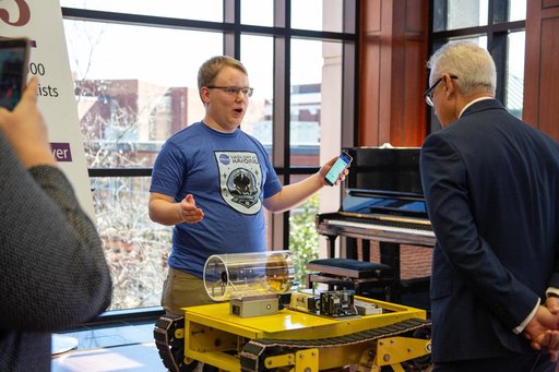 NASA's Chief Technologist Talks with a Student at NASA Day in Arkansas