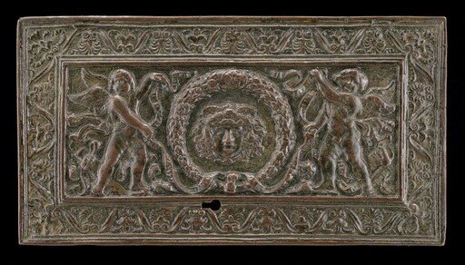 Cover of a writing casket: Geniuses with Wreath and Medusa Head