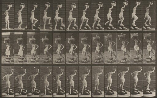 Plate Number 179. Stepping on and over a rock, a basket on head and right hand raised