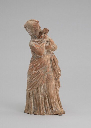 Woman with a Baby in her Arms
