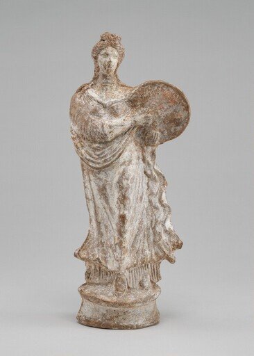 Woman Playing a Tambourine