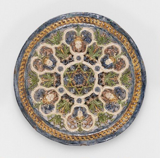 Round Openwork Dish with Masks in Trefoils