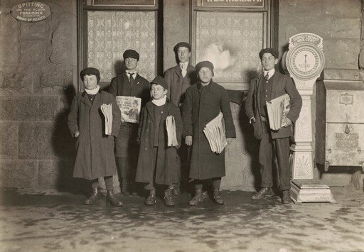 8:30 P.M. Group of newsboys selling at the depot, Hartford, Connecticut. Smallest boy 11 years old.