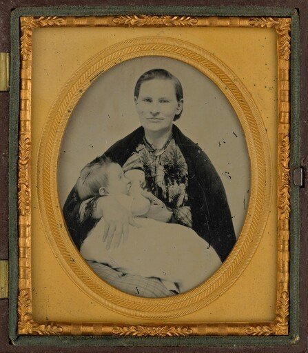Portrait of a Mother Nursing Baby