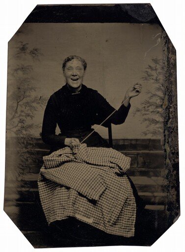 Portrait of a Woman Sewing