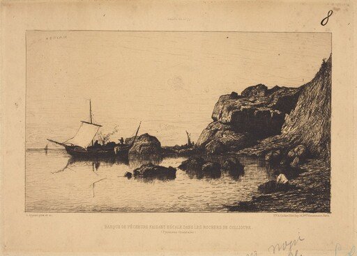 Barque de pecheurs faisant escale dans les rochers de Collioure