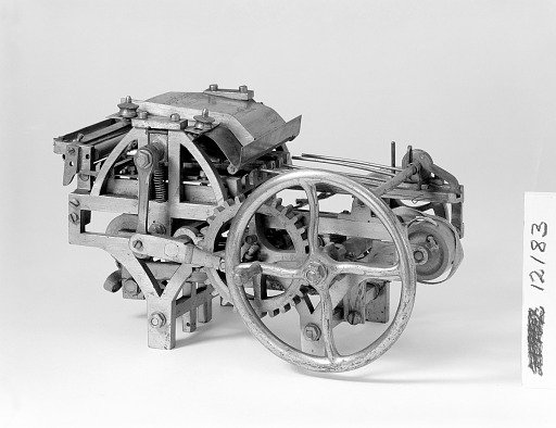 Patent Model of a Sheet Feeder and Fly Operation for a Bed-and-Platen Press