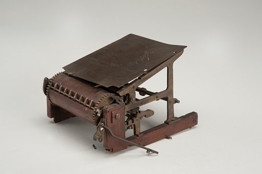 Patent model for feeding apparatus for cylinder presses
