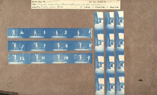 Turning, ascending stairs, water jar on left shoulder