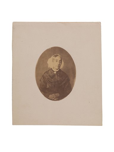 Portrait of a woman wearing a bonnet