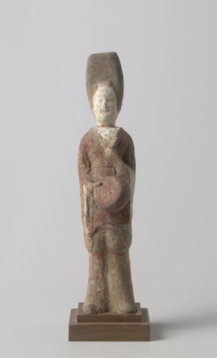 Tomb figure in the shape of a woman with a timbrel