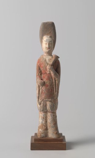 Funeral figure in the shape of a woman with a trumpet