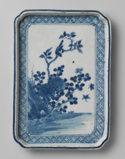 Rectangular dish with flowering plants, a bird and insects near a rock