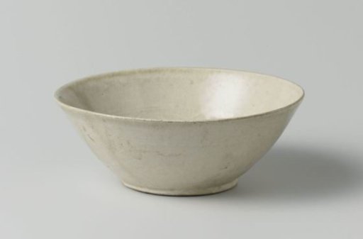 Bowl with a border of floral scrolls in relief