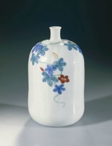 Sake bottle with fluted sides and a continuous flower spray