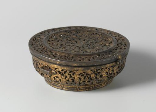 Box with lid and openwork decoration