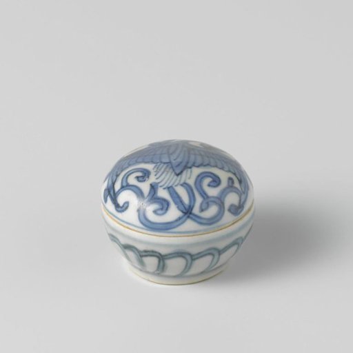 Round box with a feng huang and scrolling vines