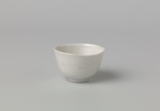 Bowl with a white glaze and irregular rim