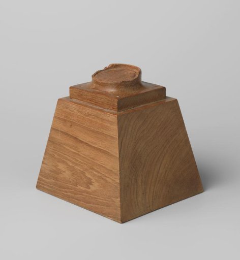 Pedestal of the head of a god