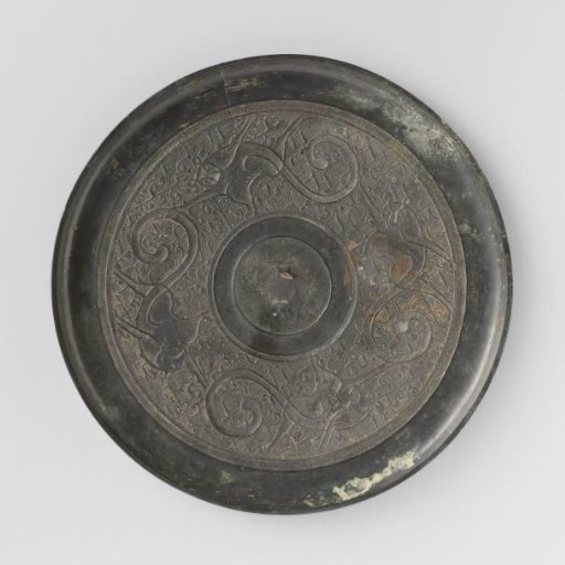 Mirror decorated with four monkeys