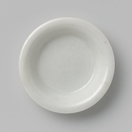 Small dish with incised 'shou' symbol