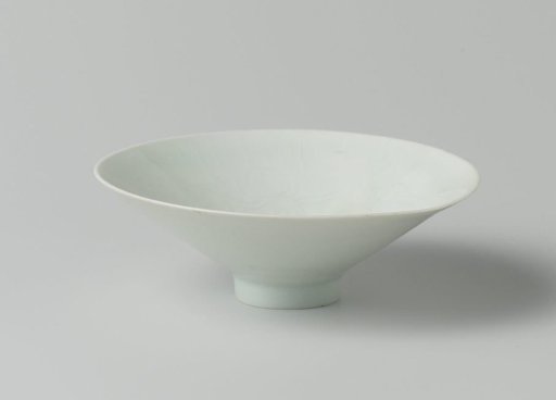 Conical bowl with an incised foliate scrolls