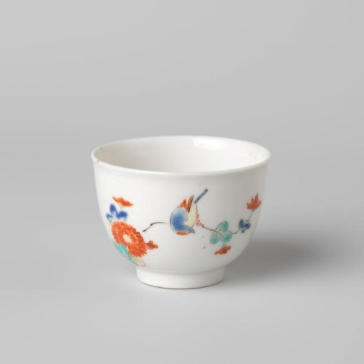 Round cup with flower spray and bird