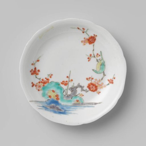 Lobed saucer with flower spray and bird